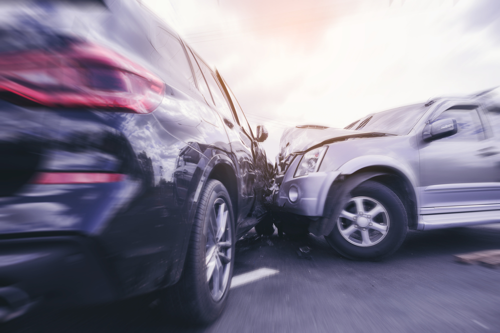 Two heavily damaged SUVs involved in a high-speed collision, symbolizing a car accident with a drunk driver on the 4th of July—Blume Forte Attorneys at Law helps injury victims pursue justice after serious holiday crashes.  